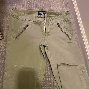 Green skinny jeans AE